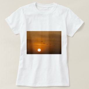 Birds flying in sunset T-Shirt