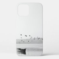 BIRDS FLYING OVER BOAT
