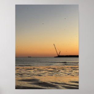 Birds in Flight and Distant Crane during sunset Poster