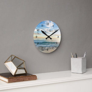 Birds in flight over the ocean round clock