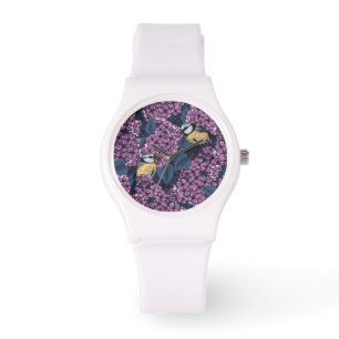 Birds in violet lilac garden watch
