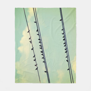 Birds on wires, vintage blue sky. fleece blanket