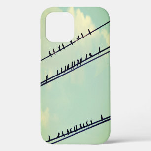 Birds on wires, vintage blue sky. iPhone 12 case