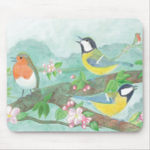 Birds sing on a blossoming tree branch in spring mouse pad