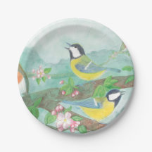 Birds singing on a blossoming tree branch  