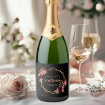 Birthday black gold geometric floral burgundy sparkling wine label<br><div class="desc">A chic black background with a faux gold geometric frame. Decorated with dark purple and burgundy flowers, roses and boho style feathers. Templates for a name, and a date. Date of birth or the date of the party, golden letters. With the text: 50th (or any age) Birthday written with golden...</div>