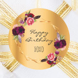 Birthday gold floral geometric burgundy classic round sticker<br><div class="desc">A chic shiny faux gold metallic looking background with a faux gold geometric frame. Decorated with dark purple and burgundy flowers,  roses and boho style feathers. Black hand lettered style script and the text: Happy Birthday and xoxo (hugs and kisses)  For any age.</div>