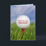 Birthday Golf Ball On Tee For Grandson Card<br><div class="desc">Close-up of golf ball on red tee in green grass for Grandson's birthday.
All text can be edited.</div>