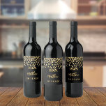 Birthday party black gold confetti name years wine label<br><div class="desc">A wine label for a 50th (or any age) birthday party.  A black background with faux gold confetti. Personalise and add birth year,  name and age. The name is written with an elegant hand lettered style script.</div>