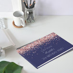 Birthday party navy blue rose gold glitter guest book<br><div class="desc">A guestbook for a feminine and glamourous 50th (or any age) birthday.  A navy blue background with rose gold faux glitter dust.  Personalise and add a name and age 50. The name is written with a modern hand lettered style script. 
Spine: add your own text.</div>