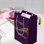 Birthday purple gold music notes medium gift bag<br><div class="desc">Dark deep purple coloured background with faux gold music notes. With the text: Happy Birthday! Golden hand lettered style script.</div>