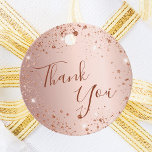 Birthday rose gold glitter dust thank you favour tags<br><div class="desc">A girly and trendy favour tag for Sweet 16th (or any age) birthday party. A feminine pink, rose gold faux metallic looking background decorated with faux glitter dust. Dark rose gold coloured letters. On front: The text: Thank You is written with a large trendy hand lettered style script. Back: The...</div>