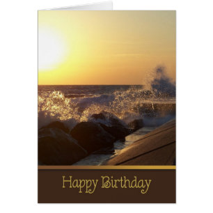 birthday sunset over beach rocks