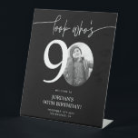 Black 90th Birthday Welcome Sign | Look Who's 90<br><div class="desc">Welcome guests to your 90th birthday celebration with this stunning editable welcome sign. Featuring a sleek, customizable layout, this template allows you to easily add your own photo and personalize the text, making it a perfect addition to your milestone 90th birthday decor. Ideal for entryways or as a party focal...</div>