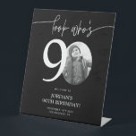 Black 90th Birthday Welcome Sign | Look Who's 90<br><div class="desc">Welcome guests to your 90th birthday celebration with this stunning editable welcome sign. Featuring a sleek, customizable layout, this template allows you to easily add your own photo and personalize the text, making it a perfect addition to your milestone 90th birthday decor. Ideal for entryways or as a party focal...</div>