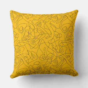 Black abstract drawings on a bright yellow backgro cushion