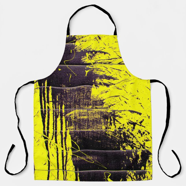 Black abstract splatter paint drips on a bright ye apron (Front)