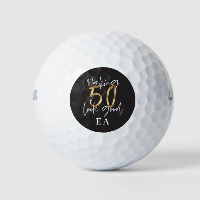 Black and gold fun 50th birthday golf balls (Front)