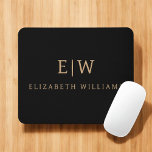 Black and Gold Minimalist Modern Monogram Mouse Pad<br><div class="desc">Elevate your desk setup with this Black and Gold Minimalist Modern Monogram Mouse Pad. Featuring a sleek black background and bold faux gold monogram, this design combines contemporary style with personalised flair. Perfect for professionals, students, or anyone who appreciates elegant desk accessories, this mouse pad adds a refined touch to...</div>