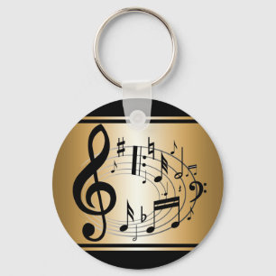 Black and gold musical notes in oval shape key ring