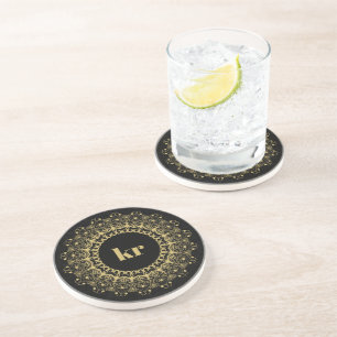 Black and gold ornate mandal pattern coaster