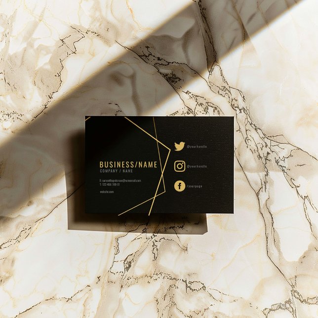 Black and gold social media business card (Black business card with gold geometric lines, social icons, and modern typography.)