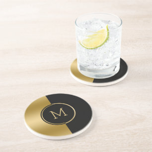 Black and gold split-screen monogram coaster