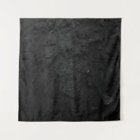 Black and gray stone fragment