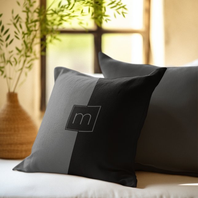 Black and grey split-screen geometric design cushion (Creator Uploaded)