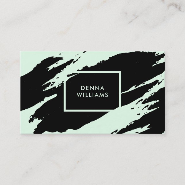 Black and light-green messy brushstrokes business card (Front)