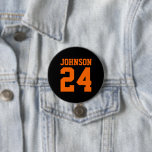 Black and Orange Athlete Name Jersey Number 7.5 Cm Round Badge<br><div class="desc">Cheer on your favourite sports team, football player or just show off your school pride with a custom personalised spirit button! Add your school name or personalise with a player's name and jersey number. Perfect for football, basketball, baseball and soccer games! Create custom pins for the whole team, cheerleaders, parents...</div>