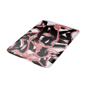 Black and salmon scraps, destroyed tapes on white bath mat