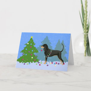 Black and Tan Coonhound Decorating Christmas Tree Holiday Card