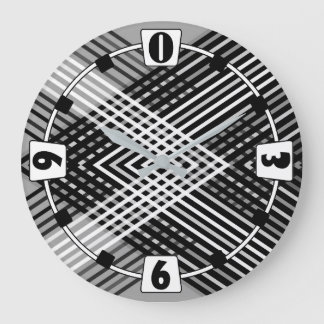 Black and white and grey intertwined stripes on a large clock