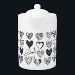 Black and White Cat and Heart Pattern<br><div class="desc">Playful cat tugging at a heart shaped balloon surrounded by different patterned hearts in black and white.</div>