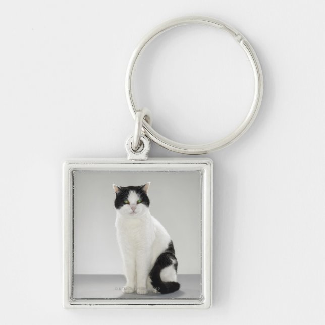 Black and white cat with glowing green eyes key ring (Front)