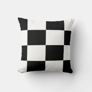 black and white chequered board pattern cushion