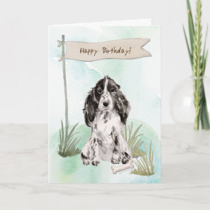Black and White Cocker Spaniel Dog Under Birthday Card