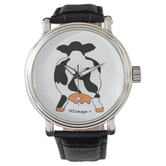 Black and White Cow Behind Watch