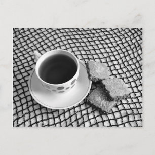 Black and white. Cup of tea and cookies postcard