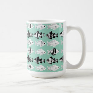 Black and white fish on teal background  coffee mug
