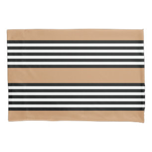 Black and white five stripe pattern with tan pillowcase