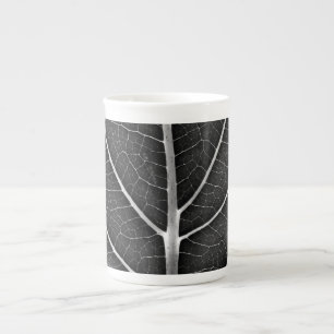 Black and white glowing leaf close-up bone china mug