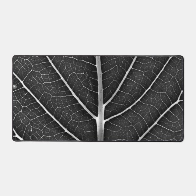 Black and white glowing leaf close-up desk mat (Front)