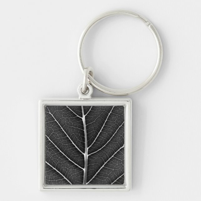 Black and white glowing leaf close-up key ring (Front)