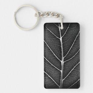 Black and white glowing leaf close-up key ring