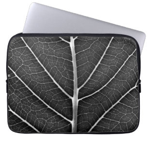 Black and white glowing leaf close-up laptop sleeve