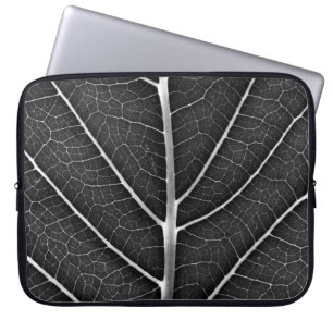 Black and white glowing leaf close-up laptop sleeve