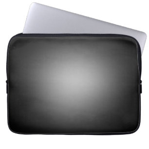 Black and white glowing spotlight laptop sleeve