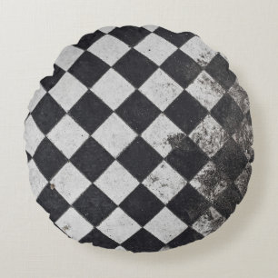 Black and white harlequin graphic round cushion